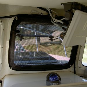 (Valkyrie) Forward window screen attaches with snaps.  A similar screen was made for the  forward hatch over the v-berth.