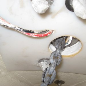 studs cut short and taped over to prevent injury if reaching in to adjust pile of rode power wires zap strapped to deck with a lot of extra length for ease of maintenace.  (cut the strap)