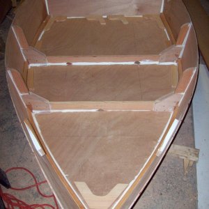 You can see laying on the floor of the dinghy I have cut the breast hook, remaining seat risers, transom knees, and quarter knees (but not yet installed).  These items require a lot of patience with careful sanding to get everything to fit snug.
