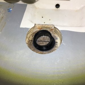 Cut into the lower area where water collects for the bilge pump and drain plug area so no puddles will form around the transponder mounting.
