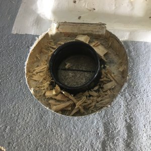 Undercut around the hole to give the fiberglass resin something to hold onto.