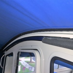 View inside where bimini is attached to roof.