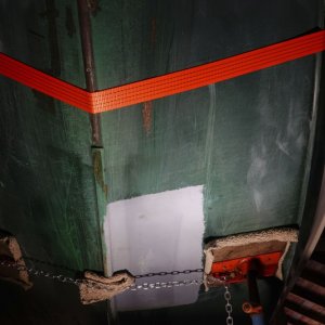 There was a painted section on the bottom of the hull that appeared "flat" - meaning it didn't follow the contour of the surrounding fiberglass. It just looked like a shoddy repair to me and I couldn't live with that.