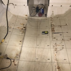 I wasn't comfortable with what might be on the other side of that patch in the hull so that area will be opened up and removed. I also went over the floor with a moisture meter.