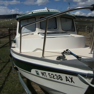 view of 3-M non skid on gunwale and carpet to cushion knees when anchoring