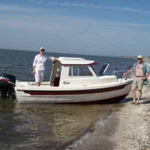 We took a Sunday cruise on Lake Pontchartrain and stopped for a while on this beach. Since the fish weren't biting, due to the spillway opening, we picked blackberries instead.