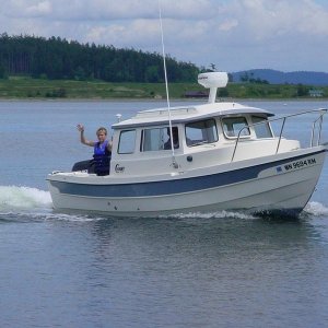 LunaC's maiden voyage - to Lopez. Nick in the cockpit.