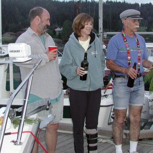 (Pat Anderson)  Bill, Dana, Rev Dave Christening Da Nag