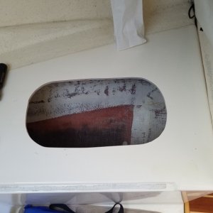Cut out on starboard side of V berth.
