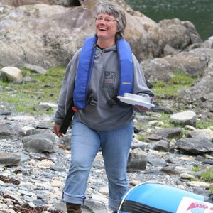 Caroline returns to the gathering with an offering.