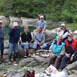 The motly crew gathered on the beach minus Robin taking the photo.
Left to right: Dave (Becky Ann?), Jim (Coho), Mark and Rosalyn (ShiRoz), Caroline and Tom (Bidarka), Signe and Denny (Shade Tree), Becky and Zoie (Becky Ann?).