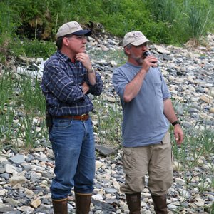 Jim and Tom enjoy a moment at the gathering.