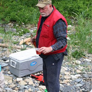 Drink anyone?  Denny enjoys the gathering.