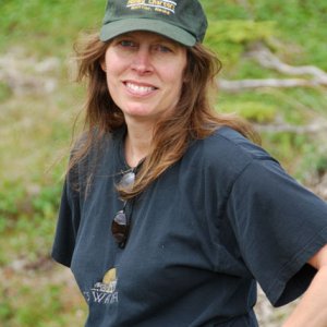 Robin on hike above Day Care Bay.