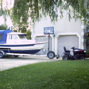 Putting Litl Tug away.  Advantages of a 16' crusier