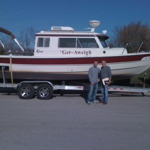 Marc and his son Landon prepare to take the Get~Aweigh to her new home in Northern Alabama.