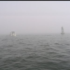 Sea Angel leads ALMA'S ONLY  across Thimble Shoel Channel, ENE of the Hampton Roads Bridge Tunnel (Rte 64) that joins Norfolk and Hampton, Virginia. Dave was our guardian angel for the 200NM trip north.