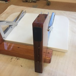 Used Starboard as seat base, rubber patch prevents rubbing against fiberglass hull.