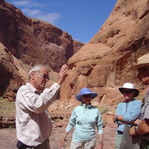 Bill explaining Rainbow Bridge geology to ranger, El, and Robbi
