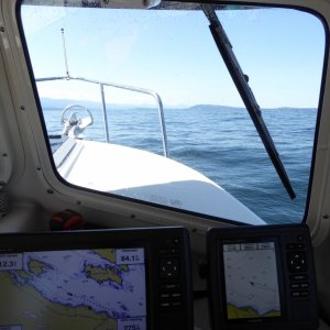 Looks flat calm but was actually bouncing along over the 4-5 foot swells coming down the strait.