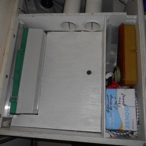 Seat cushion removed to show barrier between lower, air return plenum, and upper, cold air out plenum.