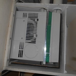 The unit is retracted when not in use.  In the Fall, it's easily lifted out and stored in the garage, leaving this space for storage.