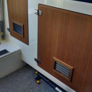 Installed louver vents to prevent mildew in aft locker. They worked.