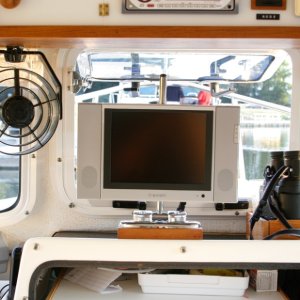 TV-Rotated-to-Viewing-Position: TV is flipped up, rotated and ready to view. Note the Digital Converter Box on the far left of the console stood up on end is bsrely visible and takes up very little space.