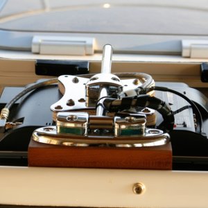 TV-Stowed-Flat-Face-Down: TV stows flat in a protected position on a rubber mat. When underway, I place the front window cover on top of the tv for anti splash protection in rough water.