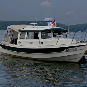 Guntersville-State-Park-Labor-Day: The Shakespeare Skywatch 2020G antenna is mounted to a SS post at the very rear of the pilot house roof.  This mount provides enough strength to lay an inflable on top of it if needed.