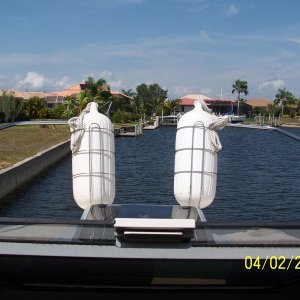 Out of the way location for fenders w/o using up storage space or obstructing the view of the front corners of the boat.