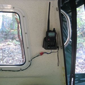 Installation for Standard Horizon HX471 handheld VHF with DSC. Cradle keeps radio close to my ear, connects to GPS for positioning and can be plugged in for charging at any time.