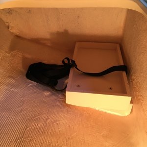 Battery holder below V-berth