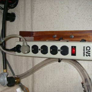 Step 2, wired power strip to the backside of inlet plug(upper left). Now I have a 15 amp resettable breaker, and an on/off indicator switch/light. My dock outlet is already GFCI.