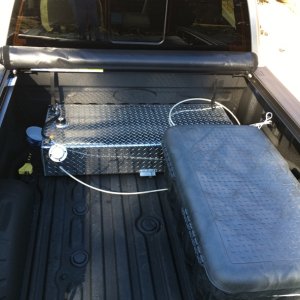 35 gallon aux diesel tank, Truxedo tonneau cover, rolled up, and storage box