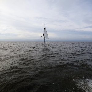 Glen,, sunken sail boat near by anchorage