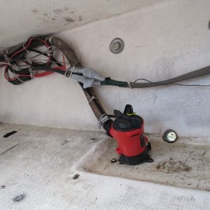 Bilge pump in hull well