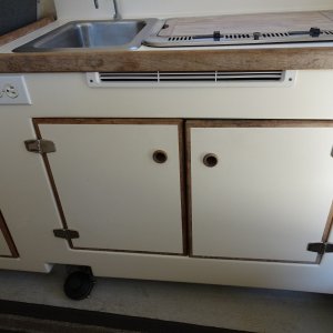 Galley and under pilot seat storage