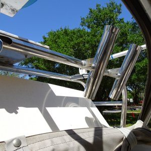 custom rod holders on radar arch, and zip open front of Bimini, to give good air flow in hot weather.