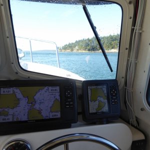Bellingham Channel was a much better option, and crossing Rosario Strait from north end of Cypress the waves were down to 1-2' and no whitecaps. Going with the current thru Obstruction Pass here.