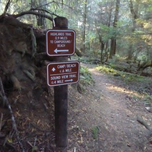 Entrance from parking lot, which is .6 miles from the beach via one trail, or .9 miles via the other trail