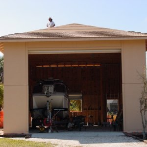 Finish the roof and take a vacation from this barn project.