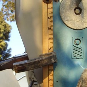 bout 8.25-8.5 inches between forward and rear holes