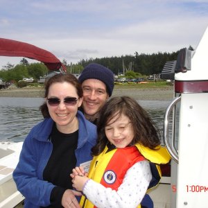Julia, Tim & oldest 
daughter (of TWO LUCKY
FISH soon to be renamed)