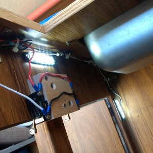 Switch on each door so opening either door will turn on the cabinet lights