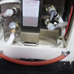 Seaward S700 Water Heater - 4 Pipes, open the two valves (drain and pressure vent) and connect the other two hoses (cold supply left, hot output right) on barbs together with 13" hose and two 1/2" double barbs.
