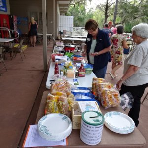 It takes these ladies to get the food set up.  Joyce is always in the lead.