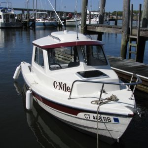 C-Dory 16 Cruiser tied to floating dock