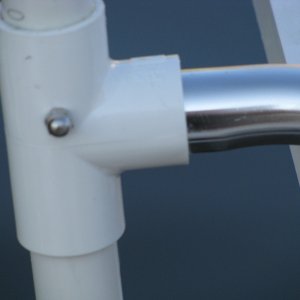 Boarding Ladder -- The Garelick fits into the PVC T-Joint, and is secured with a SS bolt and nut.