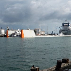 Auckland had some interesting recreational boats, but this ship was more interesting.  You drive your mega-yacht in through the stern, adjust the submerged hydraulic weighs, raise the ship's hull, and have your ocean going yacht delivered without the inconvenience of having to actually cross the ocean under your own power.  What a concept.